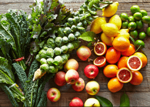 a group of fruits and vegetables on a wood surface Healthy Weight Loss Diets Robroyston
